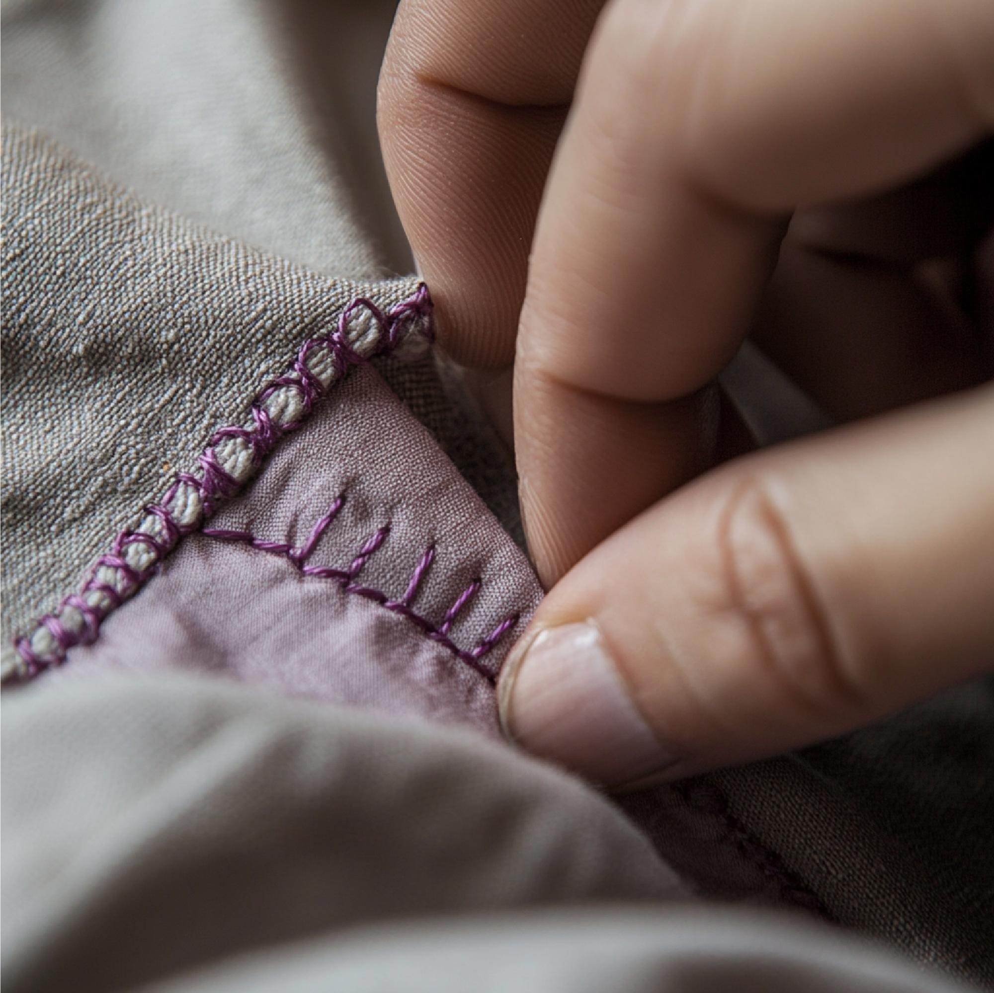 close-up of embroidered stitches on linen
